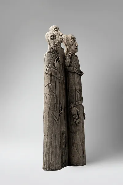 Image of One next to one by Liudmyla Davydenko, size: 54x25x11 , made of chamotte, glaze, Sculpture medium, part of the Holova/Head series, priced at €800 Photo 3 of 3.