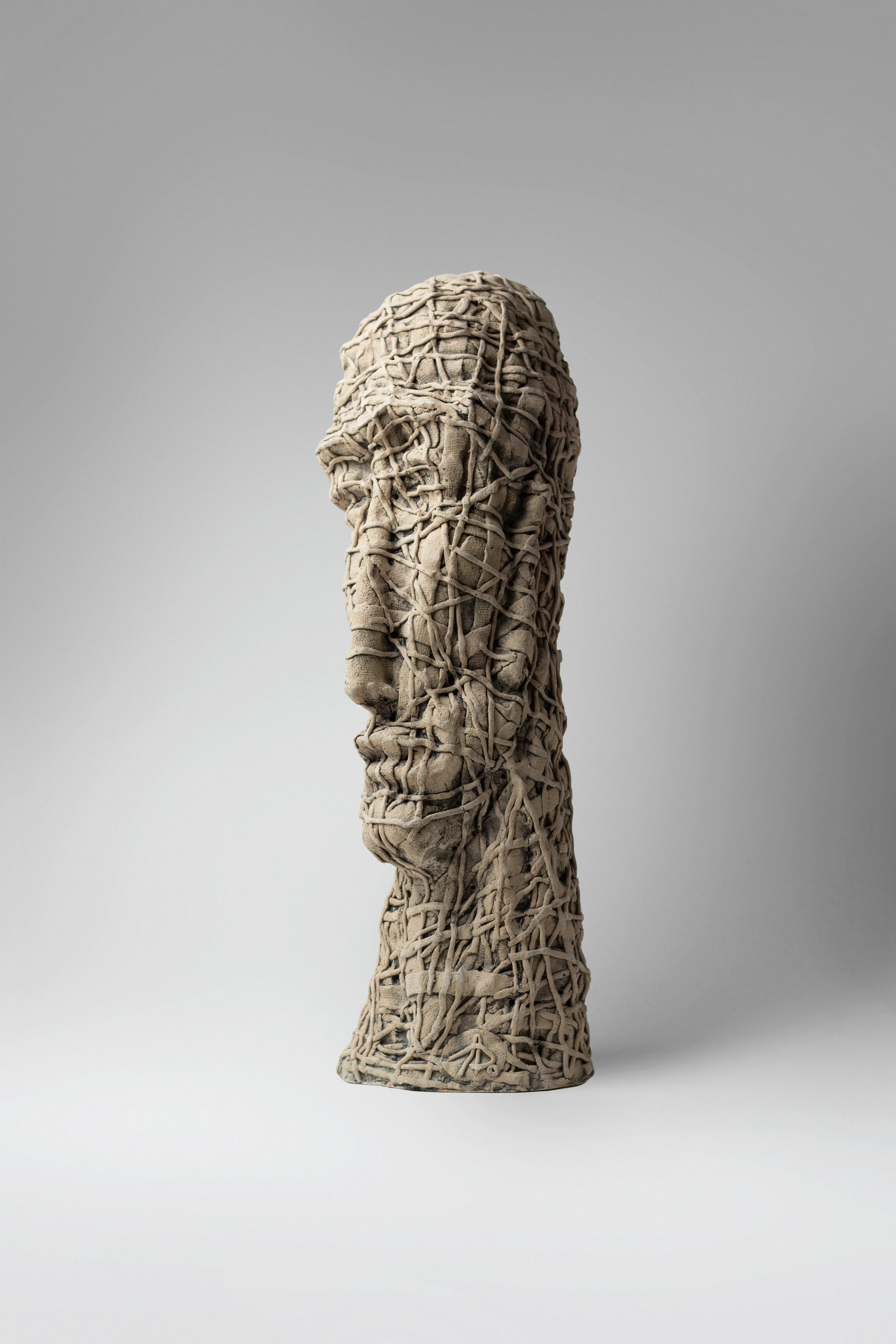 Image of If only by Liudmyla Davydenko, size: 46х15х16, made of chamotte, glaze, Sculpture medium, part of the Holova/Head series, priced at €1000 Photo 2 of 3.