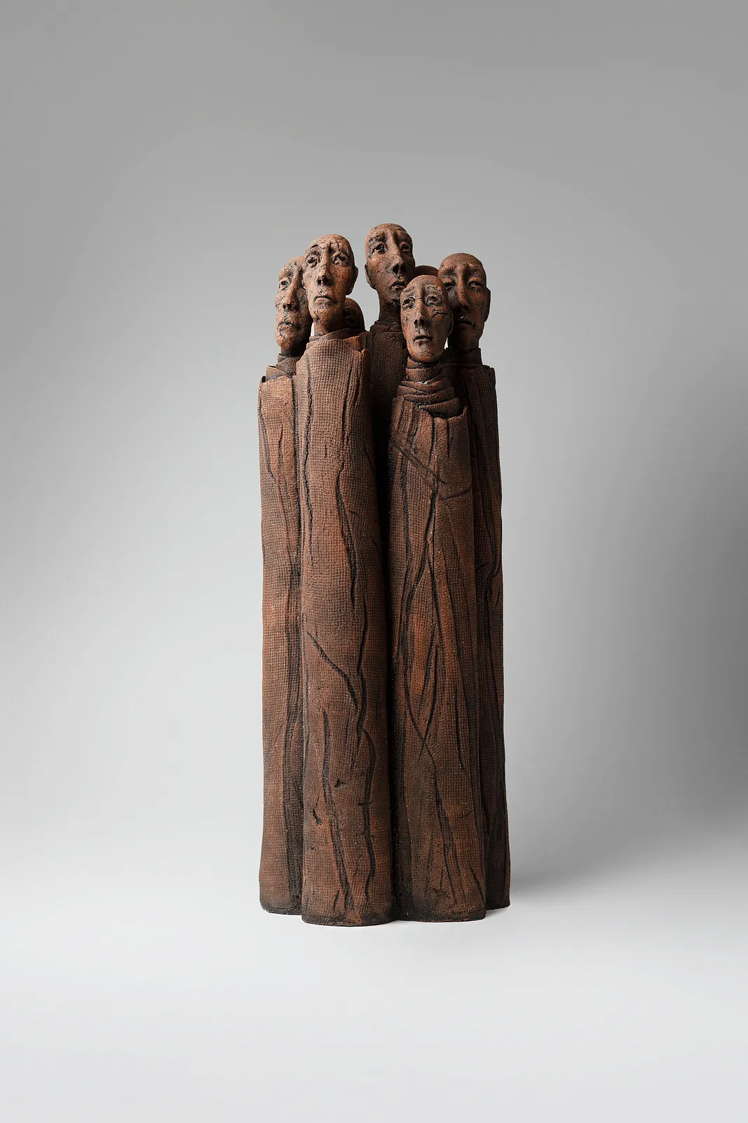 Image of One whole by Liudmyla Davydenko, size: 49x18x15, made of chamotte, glaze, Sculpture medium, part of the Holova/Head series, priced at €1000 Photo 1 of 4.