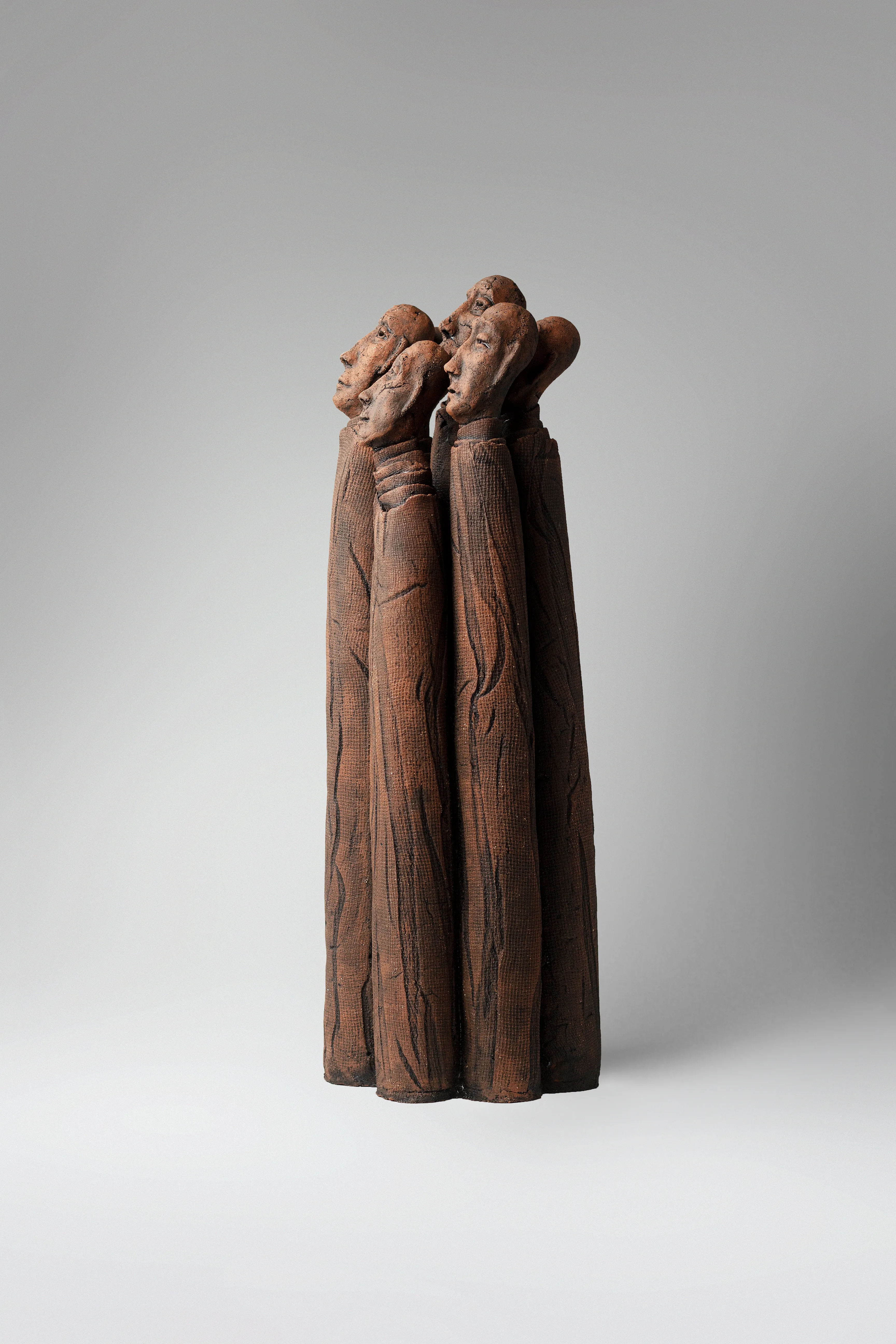 Image of One whole by Liudmyla Davydenko, size: 49x18x15, made of chamotte, glaze, Sculpture medium, part of the Holova/Head series, priced at €1000 Photo 2 of 4.