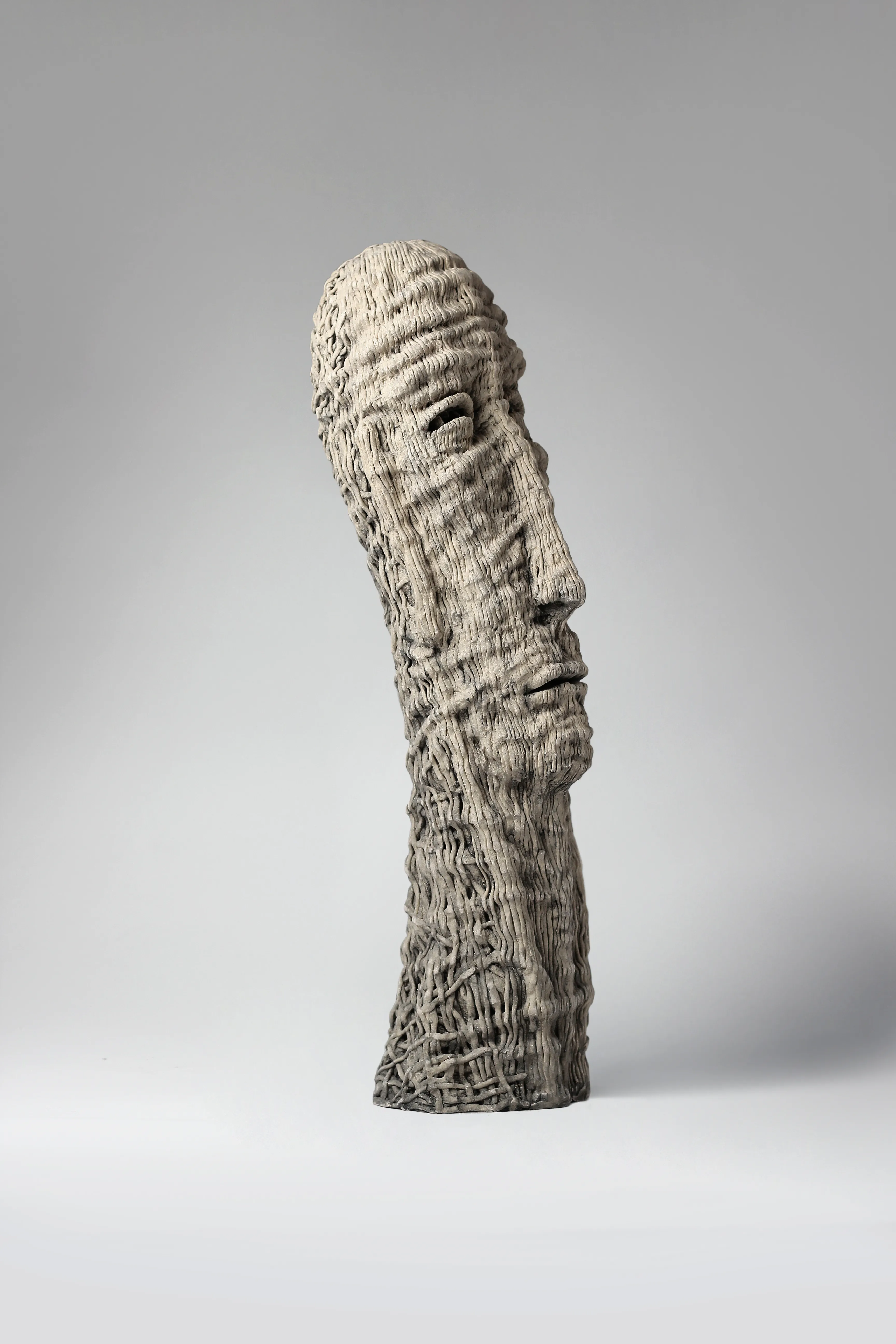 Image of Up by Liudmyla Davydenko, size: 54х15х17, made of chamotte, glaze, Sculpture medium, part of the Holova/Head series, priced at €1000 Photo 2 of 3.