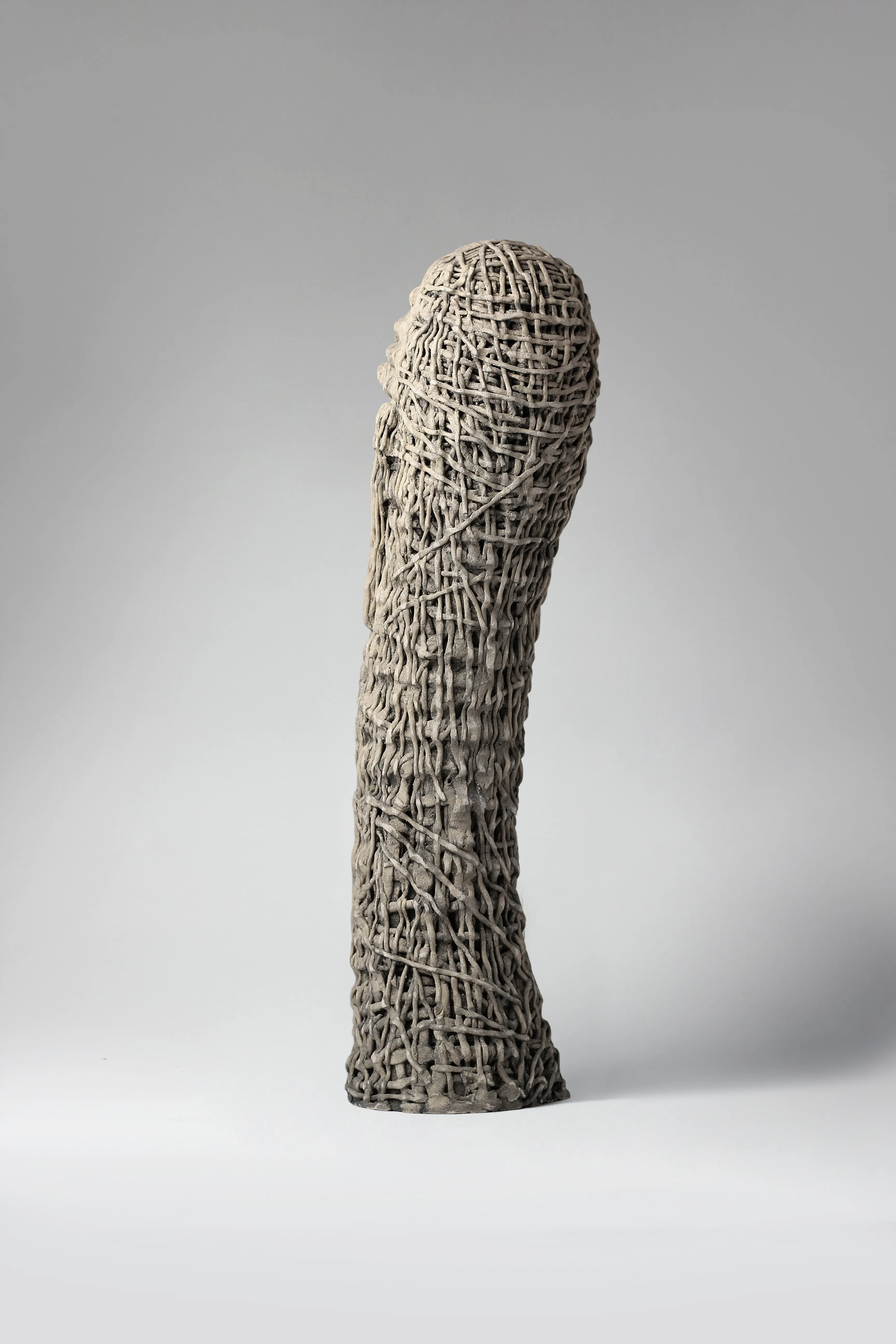 Image of Up by Liudmyla Davydenko, size: 54х15х17, made of chamotte, glaze, Sculpture medium, part of the Holova/Head series, priced at €1000 Photo 3 of 3.