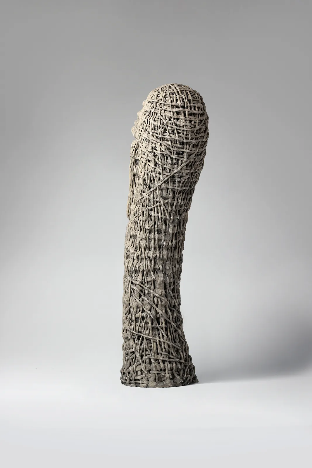 Image of Up by Liudmyla Davydenko, size: 54х15х17, made of chamotte, glaze, Sculpture medium, part of the Holova/Head series, priced at €1000 Photo 3 of 3.