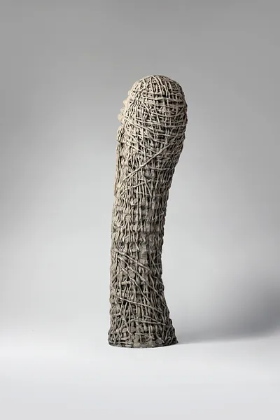 Image of Up by Liudmyla Davydenko, size: 54х15х17, made of chamotte, glaze, Sculpture medium, part of the Holova/Head series, priced at €1000 Photo 3 of 3.