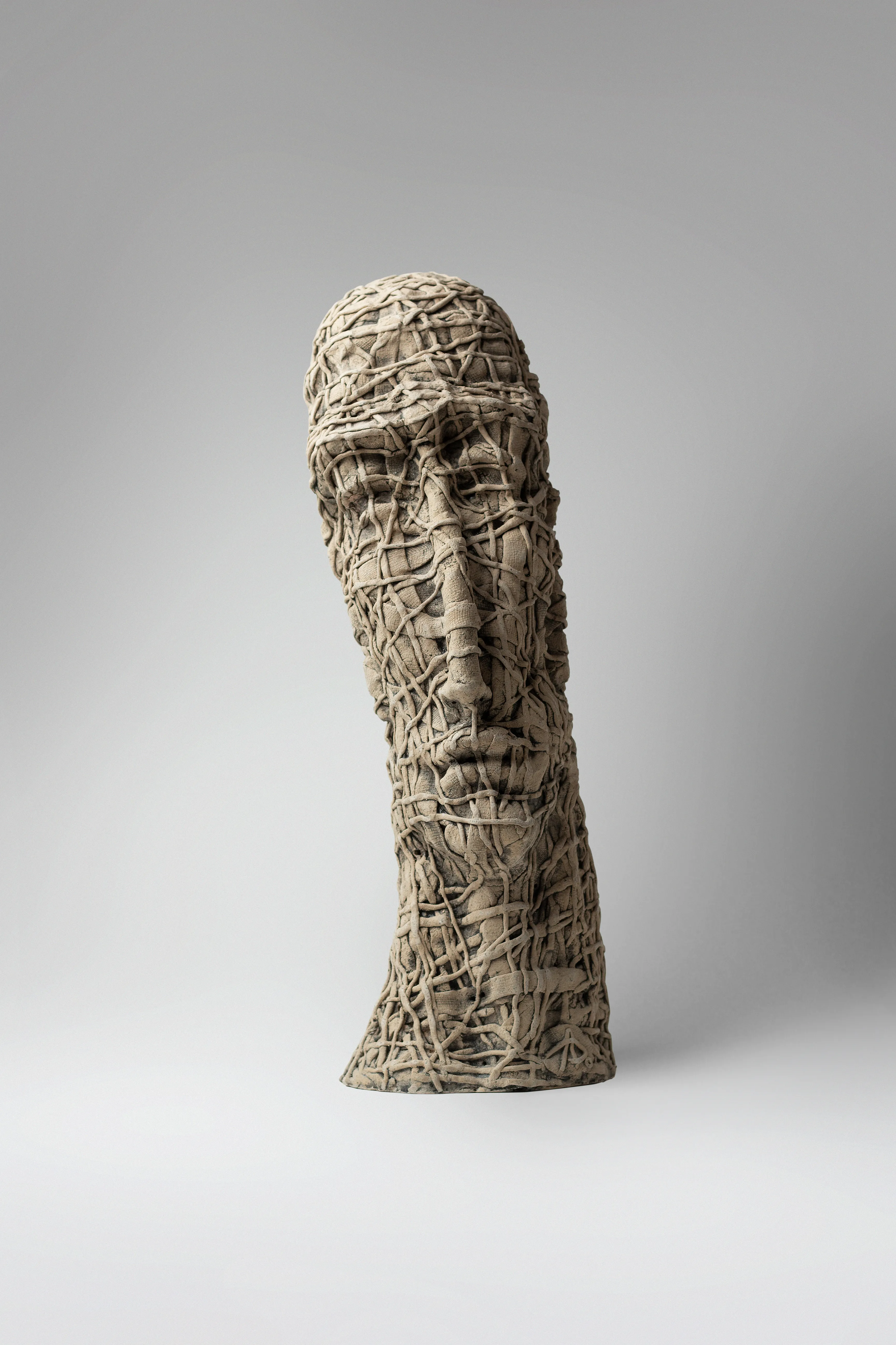 Image of If only by Liudmyla Davydenko, size: 46х15х16, made of chamotte, glaze, Sculpture medium, part of the Holova/Head series, priced at €1000