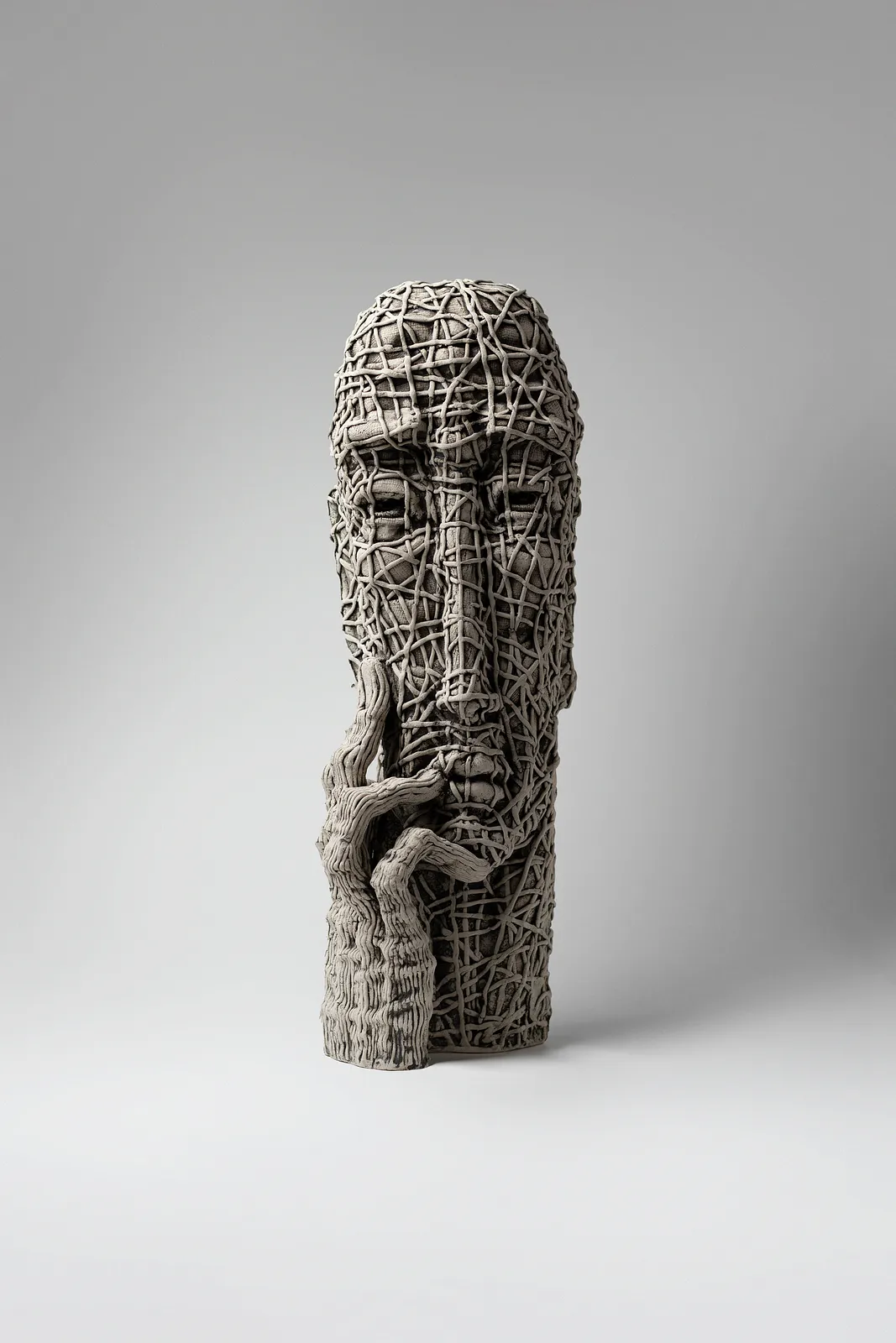Image of Understand by Liudmyla Davydenko, size: 45,5x15x18, made of chamotte, glaze, Sculpture medium, part of the Holova/Head series, priced at $1200 Photo 1 of 3.