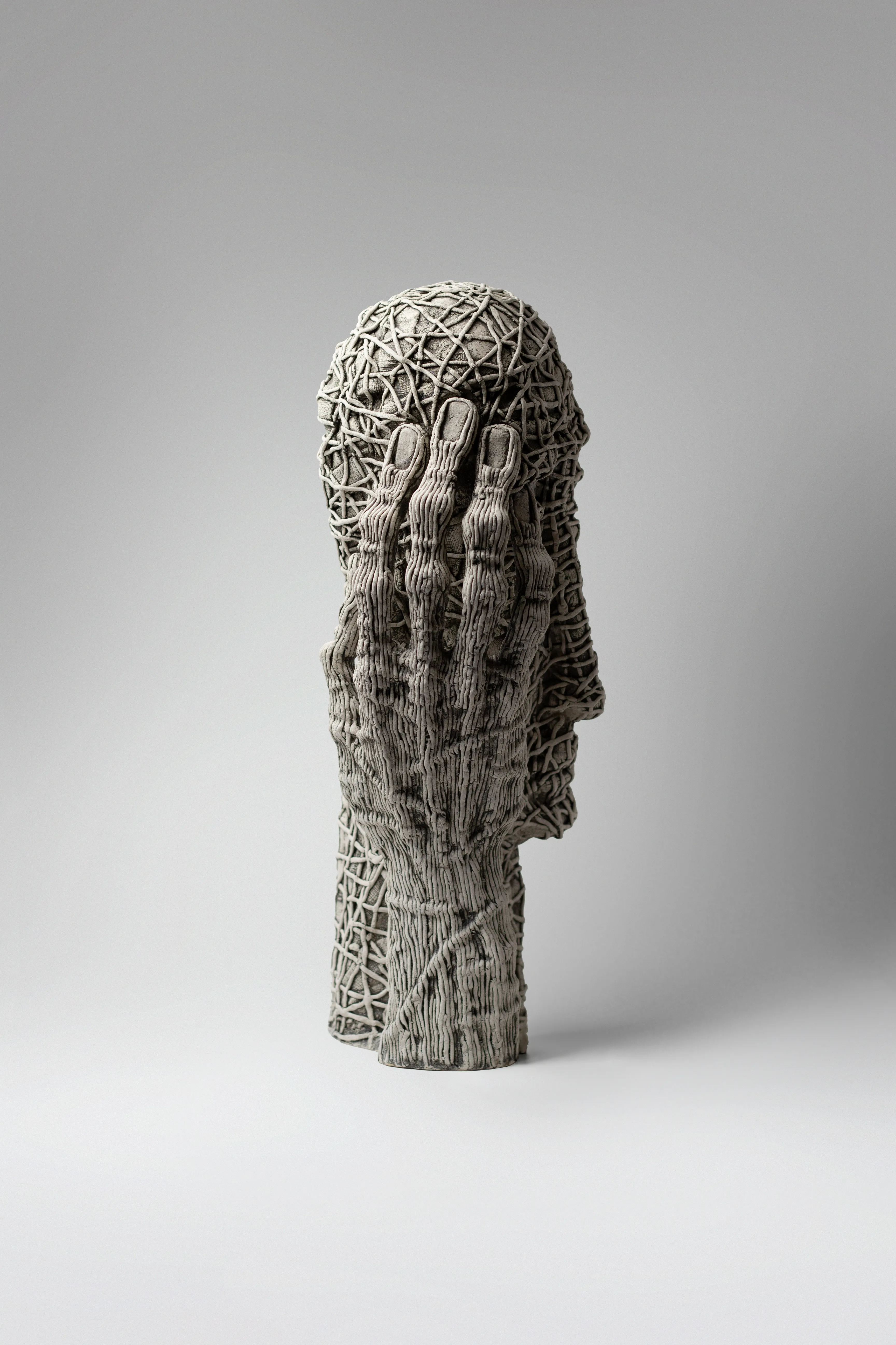 Image of To admit by Liudmyla Davydenko, size: 46х22х17, made of chamotte, glaze, Sculpture medium, part of the Holova/Head series, priced at €1200 Photo 3 of 4.