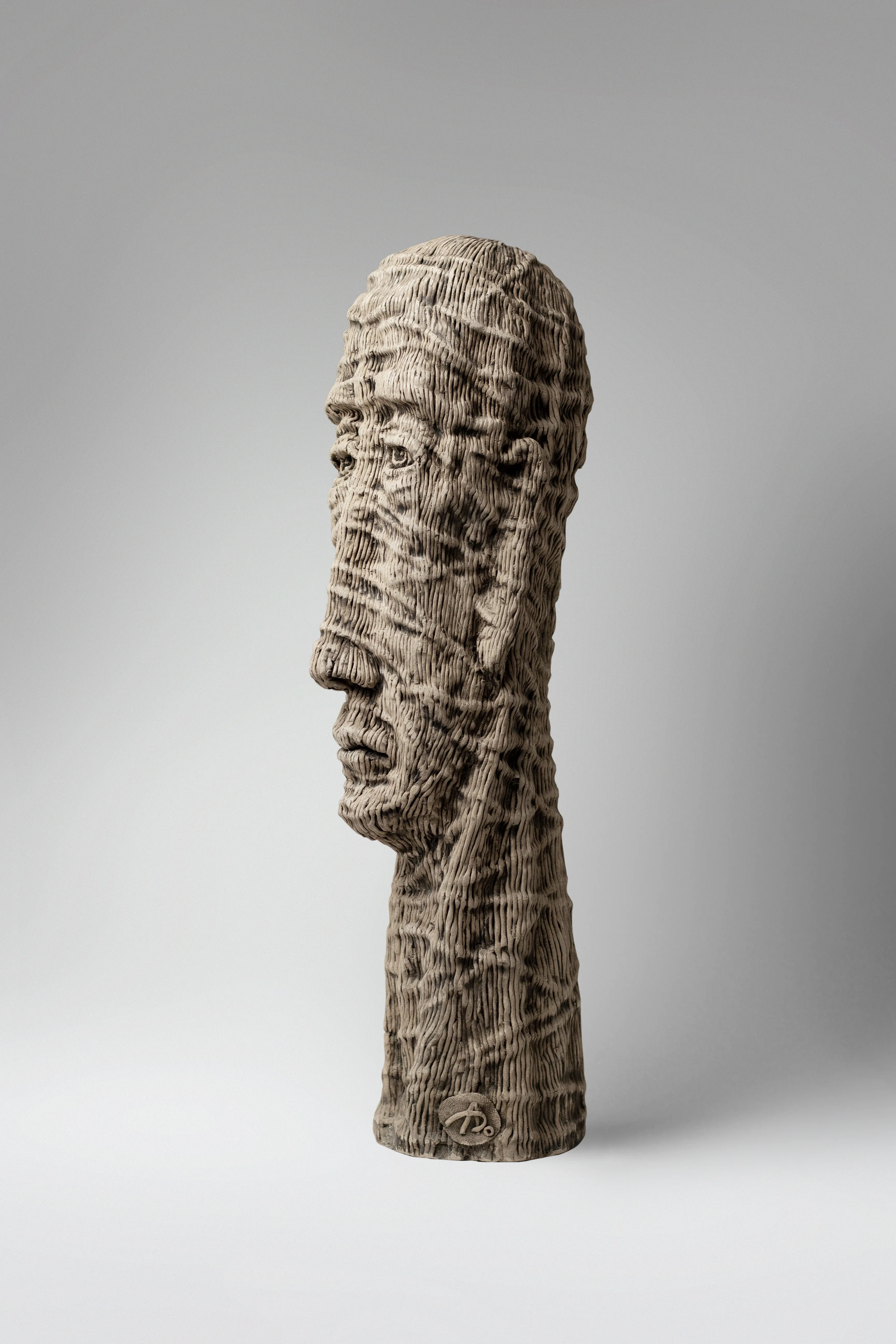 Image of Himself by Liudmyla Davydenko, size: 52х14х16, made of chamotte, glaze, Sculpture medium, part of the Holova/Head series, priced at €1000 Photo 2 of 3.