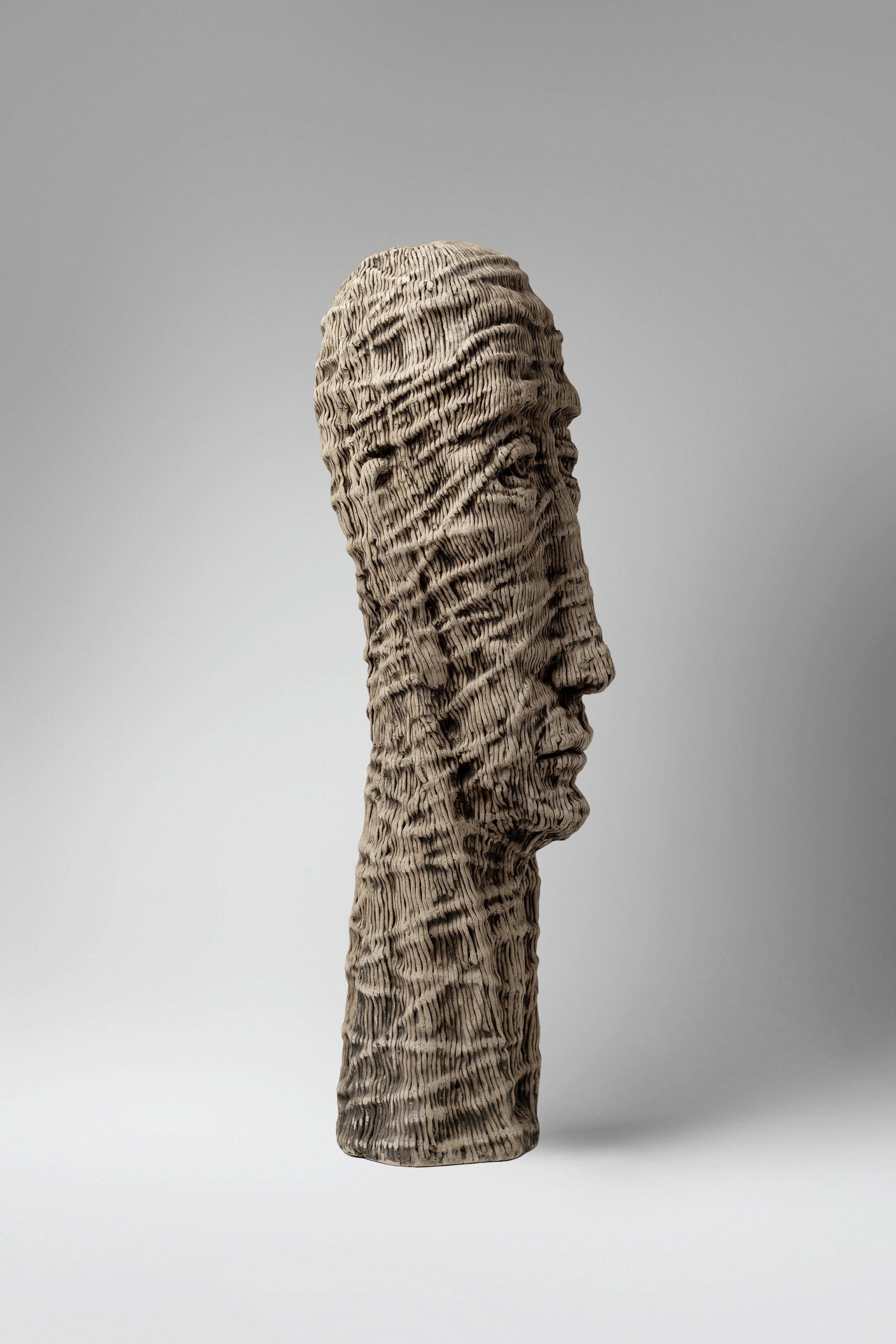 Image of Himself by Liudmyla Davydenko, size: 52х14х16, made of chamotte, glaze, Sculpture medium, part of the Holova/Head series, priced at €1000 Photo 3 of 3.
