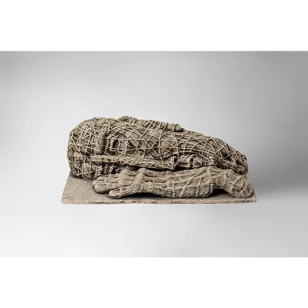 Image of The one who lying down by Liudmyla Davydenko, size: 38х21х12, made of chamotte, glaze, Sculpture medium, part of the Holova/Head series, priced at €1000