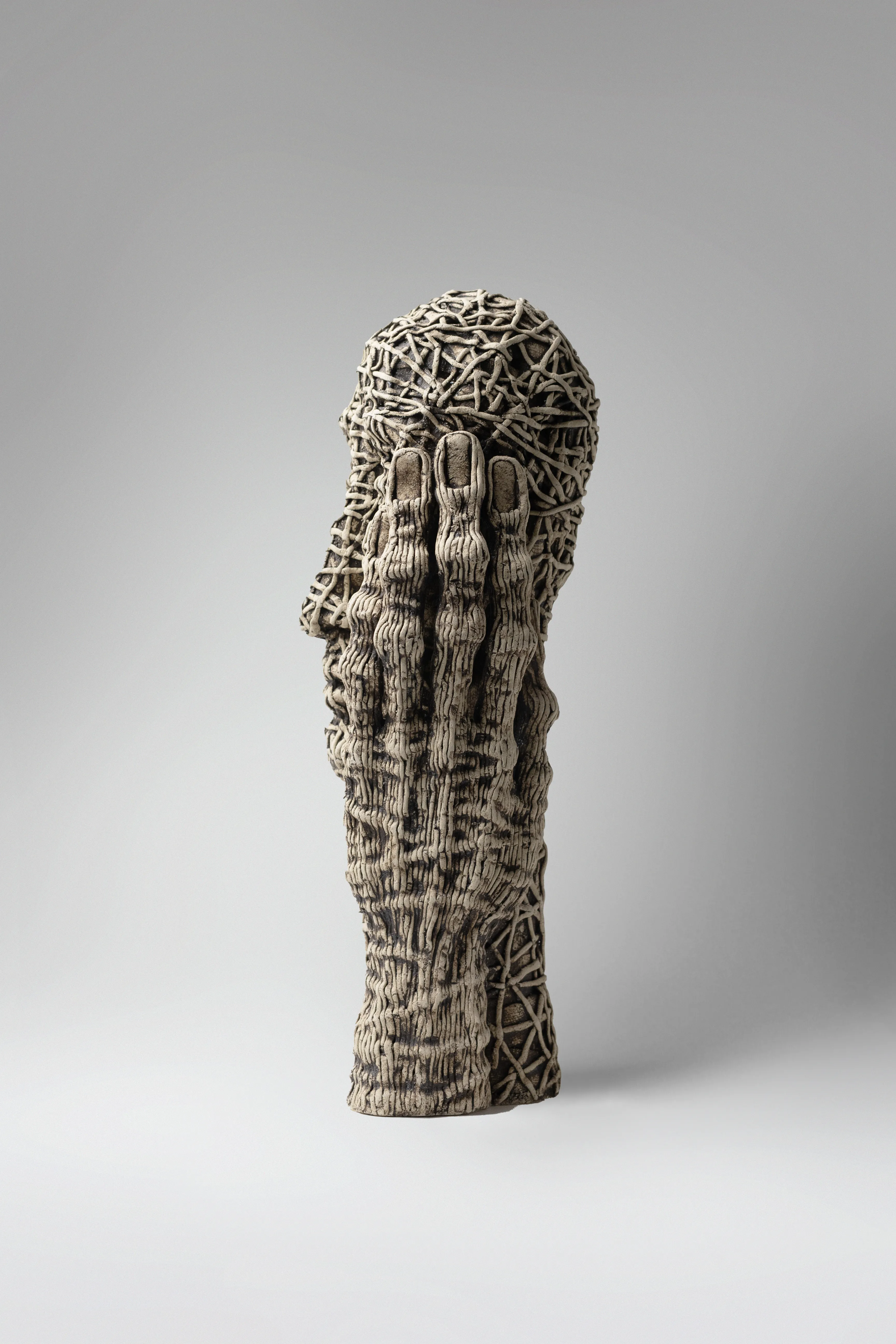 Image of Think by Liudmyla Davydenko, size: 42х16х15, made of chamotte, glaze, Sculpture medium, part of the Holova/Head series, priced at €1200 Photo 3 of 3.