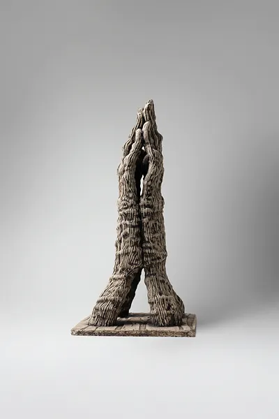 Image of Reunification by Liudmyla Davydenko, size: 37х23,5х18,5, made of chamotte, glaze, Sculpture medium, part of the Holova/Head series, priced at €700 Photo 3 of 3.