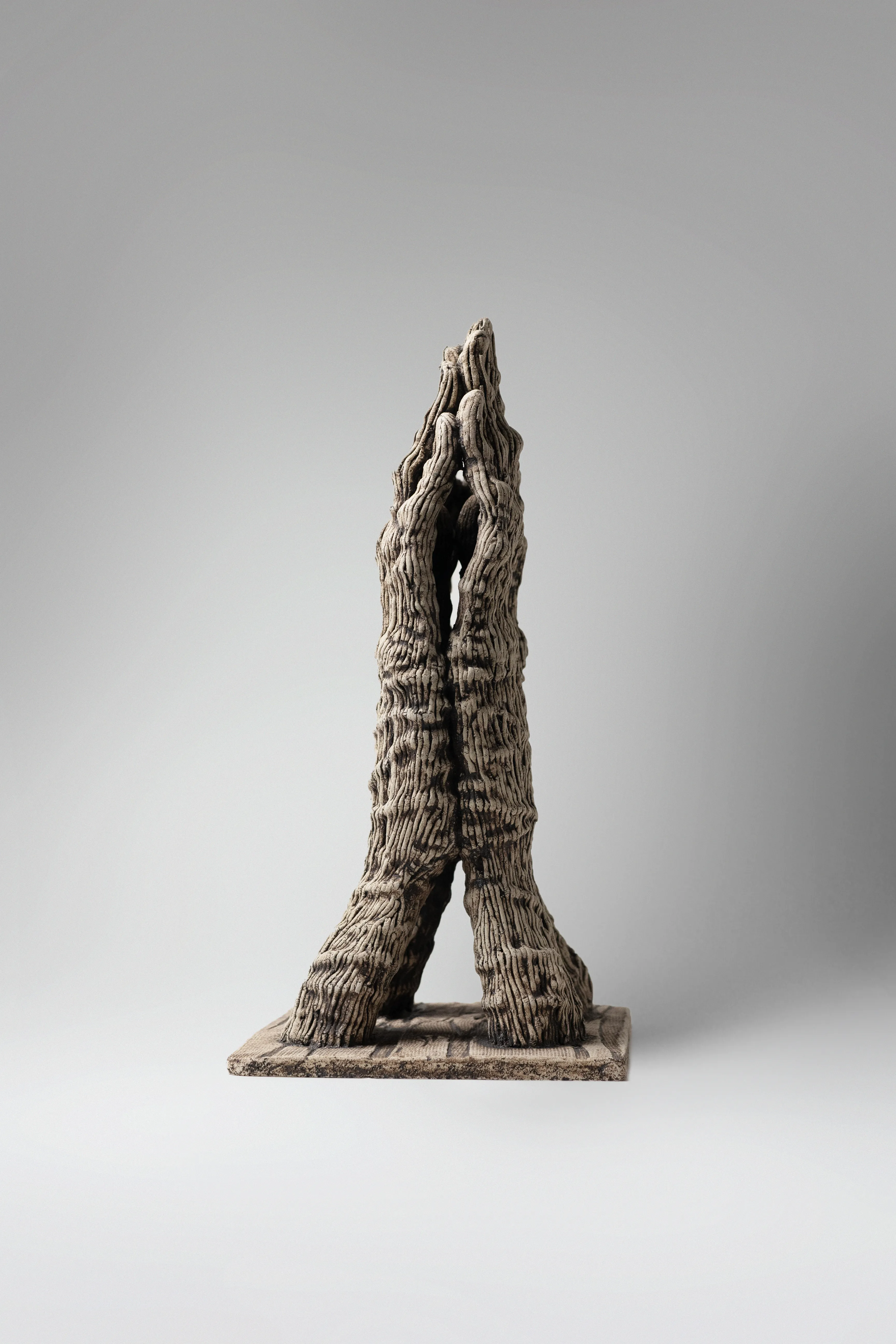 Image of Reunification by Liudmyla Davydenko, size: 37х23,5х18,5, made of chamotte, glaze, Sculpture medium, part of the Holova/Head series, priced at €700 Photo 3 of 3.