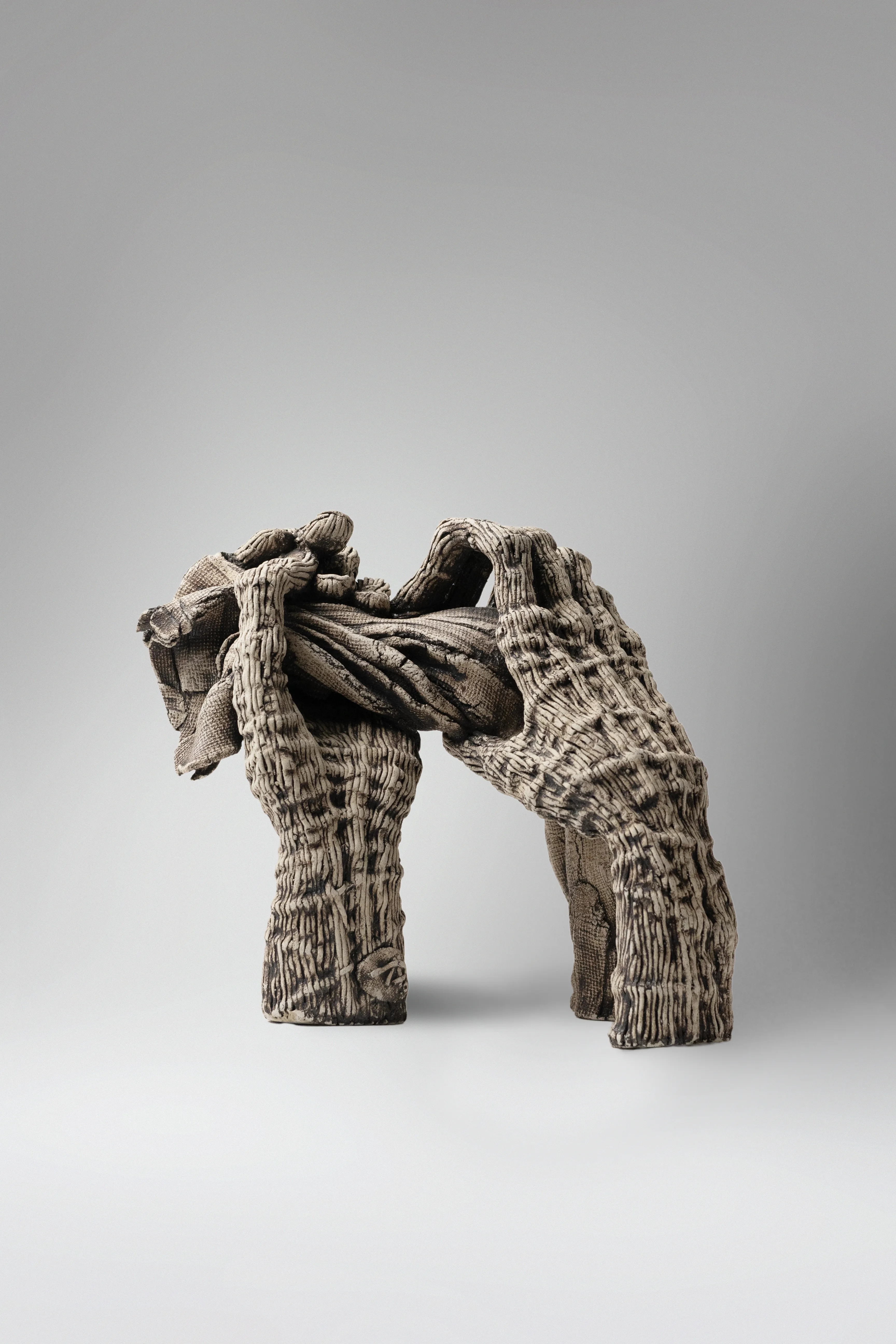 Image of To squeeze by Liudmyla Davydenko, size: 25х29х22, made of chamotte, glaze, Sculpture medium, part of the Holova/Head series, priced at €700 Photo 3 of 3.